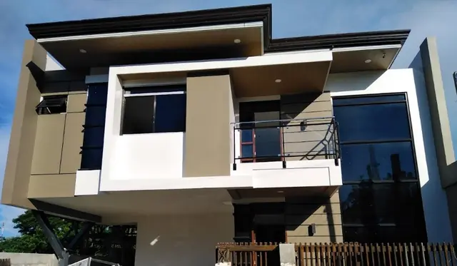 Two-Storey Residential with Double-Height Interior, photo 1 of 10