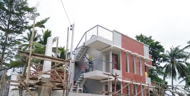Two-Storey Residential with Rooftop Terrace, photo 1 of 3